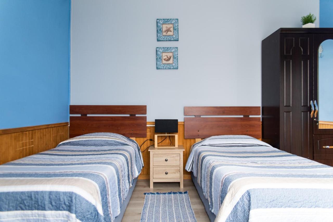 Hostal Guanaco Blanco Пуэрто-Наталес Экстерьер фото